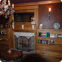 Reclaimed oak mantel and bookcases